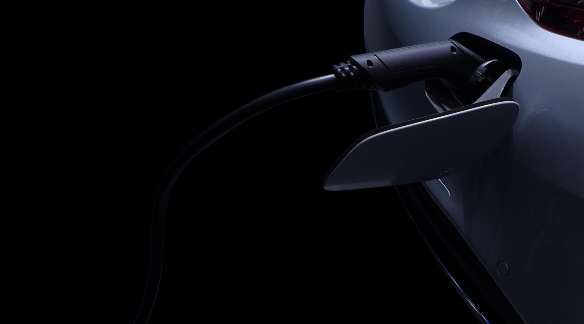 Close-up,Modern,Ev,Car,Recharging,Battery,From,Ev,Charging,Machine